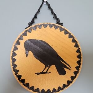 Wooden Wall Hanging with Black Crow Design